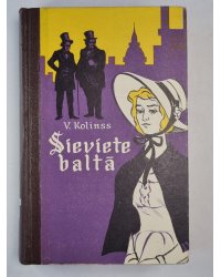 Sieviete baltā